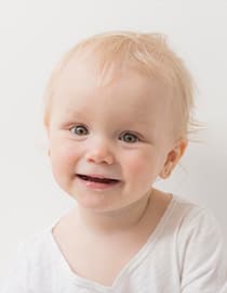 Example newborn passport photo, infant passport photo, and baby passport photo captured at home